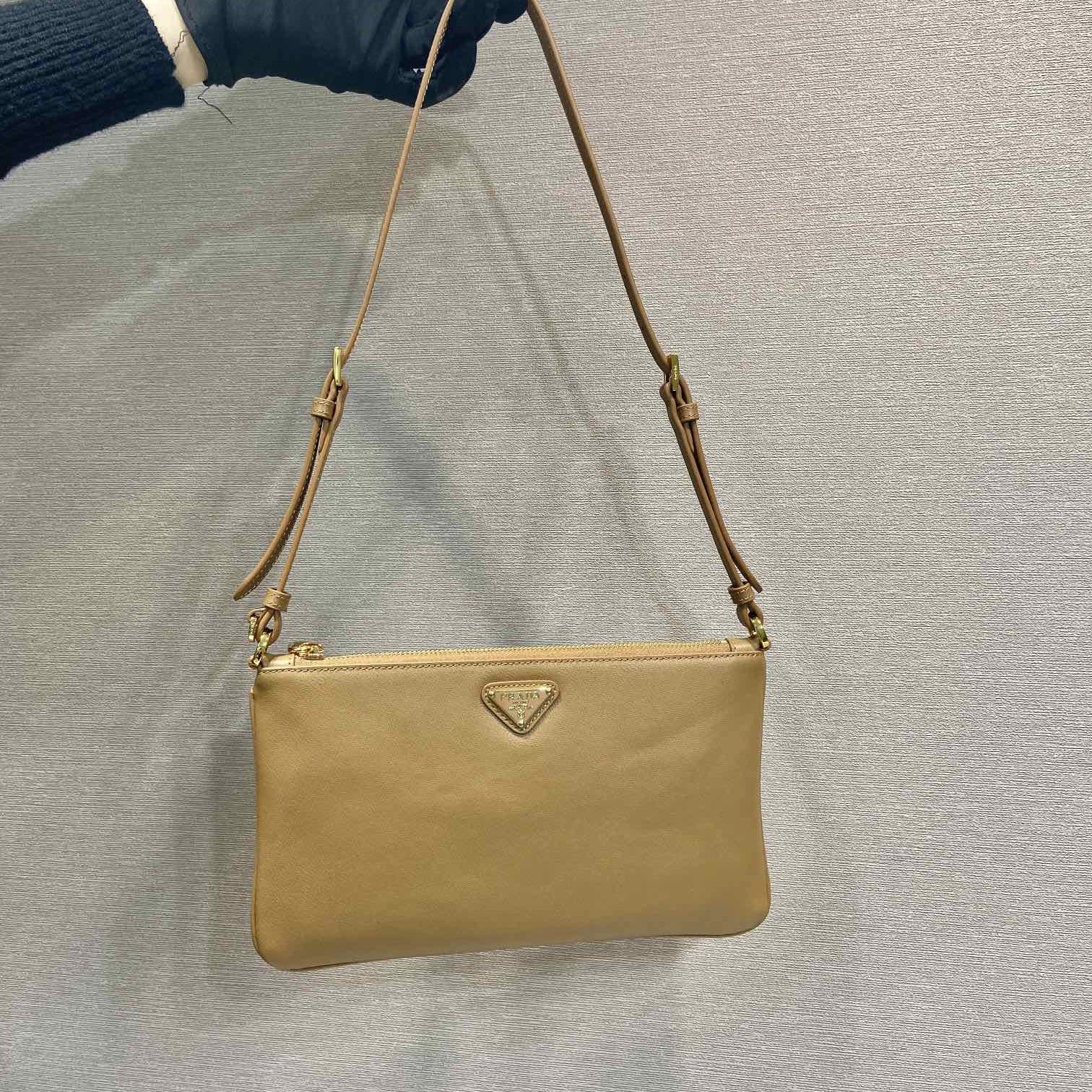 Pra*a top handle bags